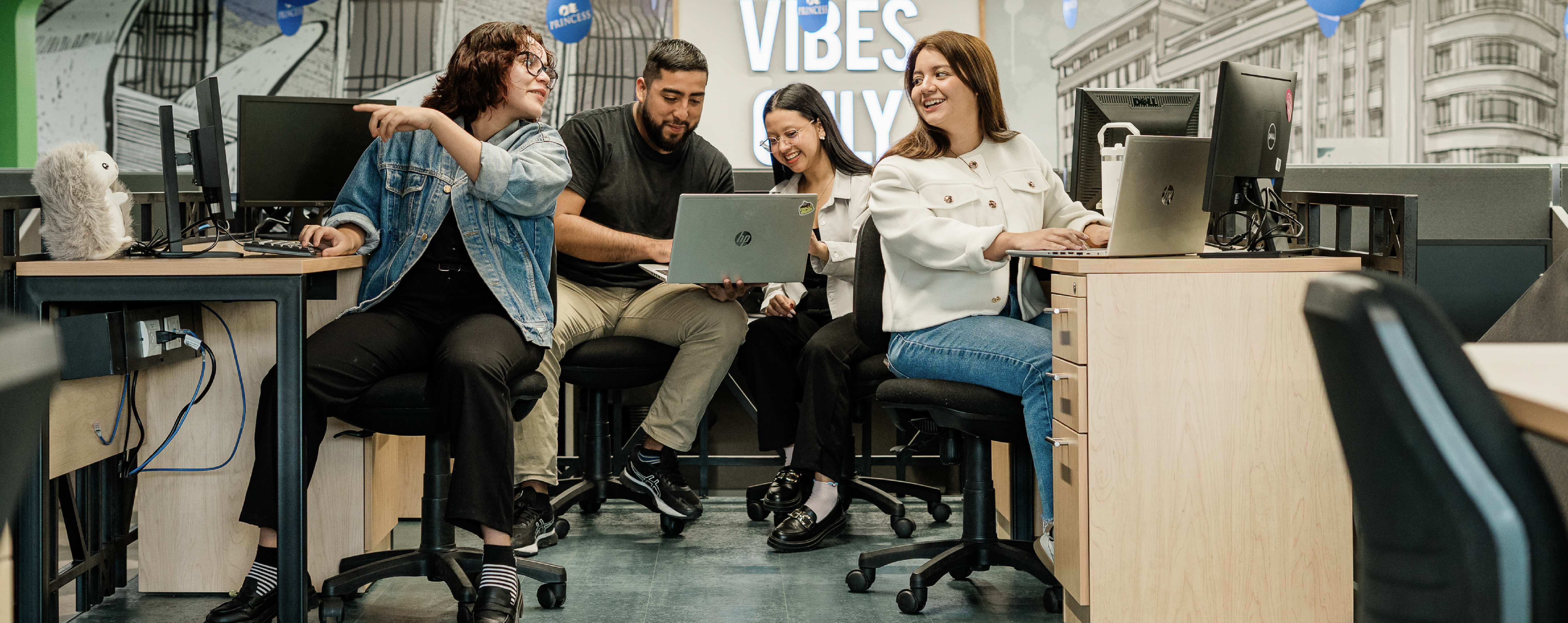 A team of young professionals collaborating in an office setting
